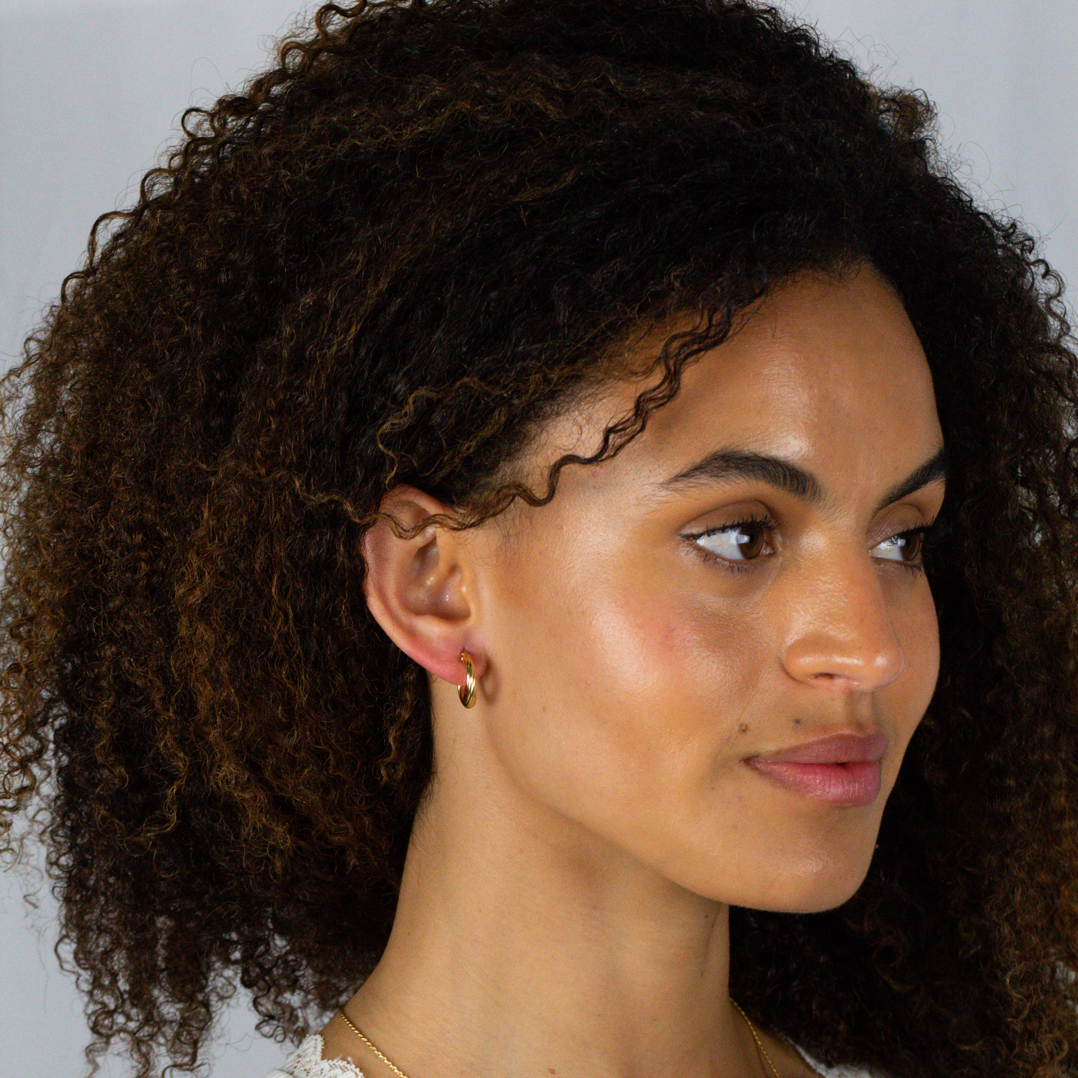 Gold hoops on model