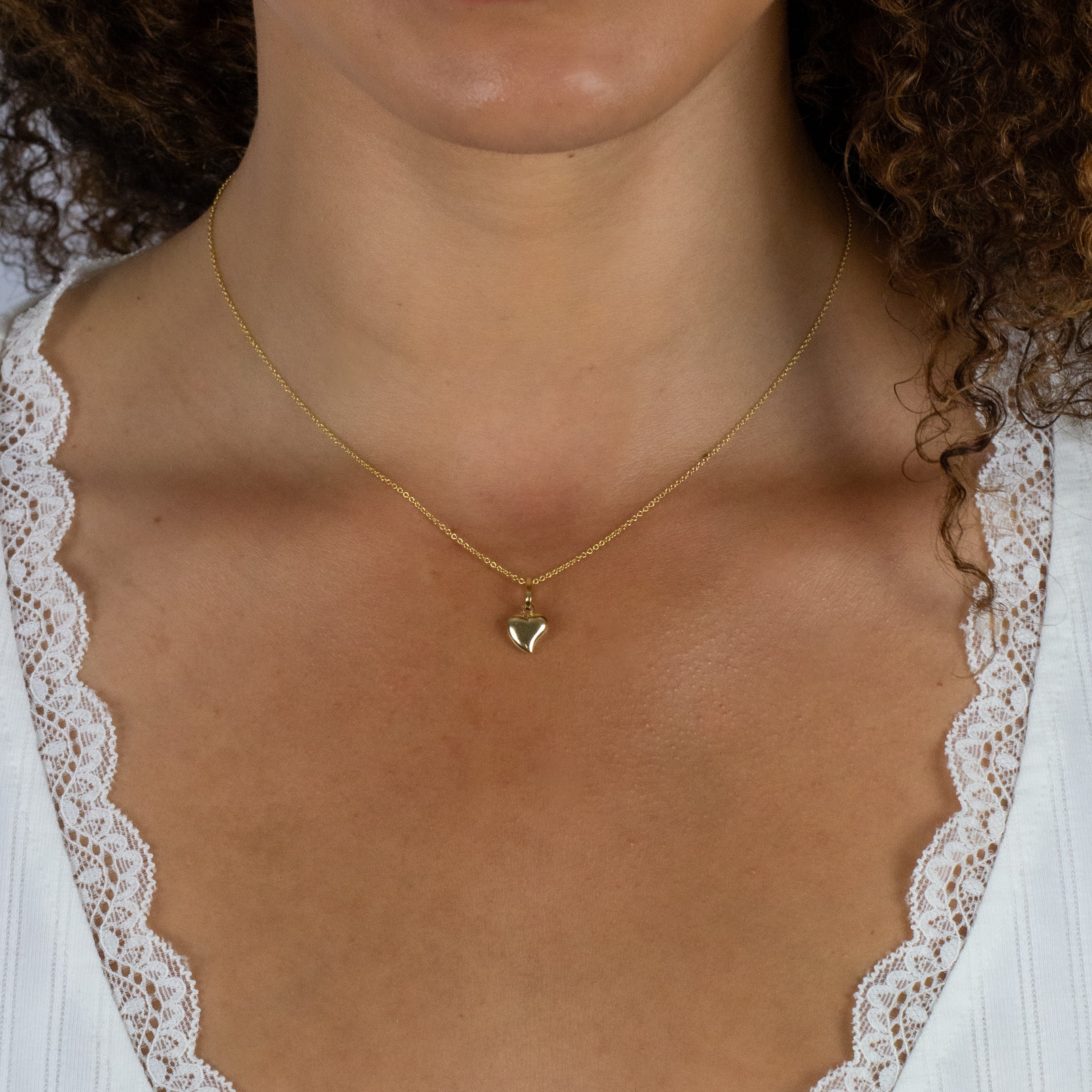 Gold heart pendant on chain