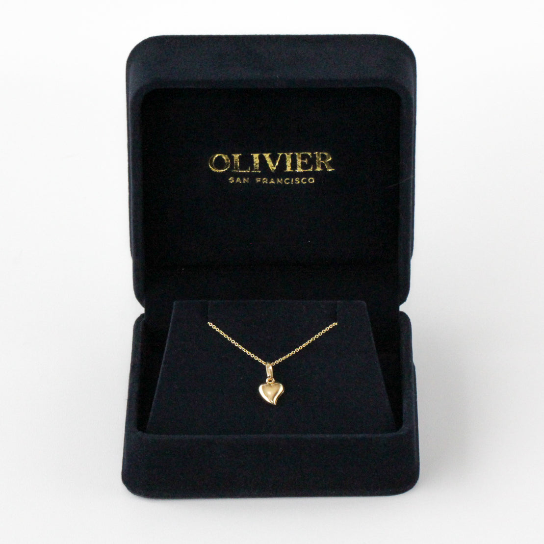 gold heart pendant in box