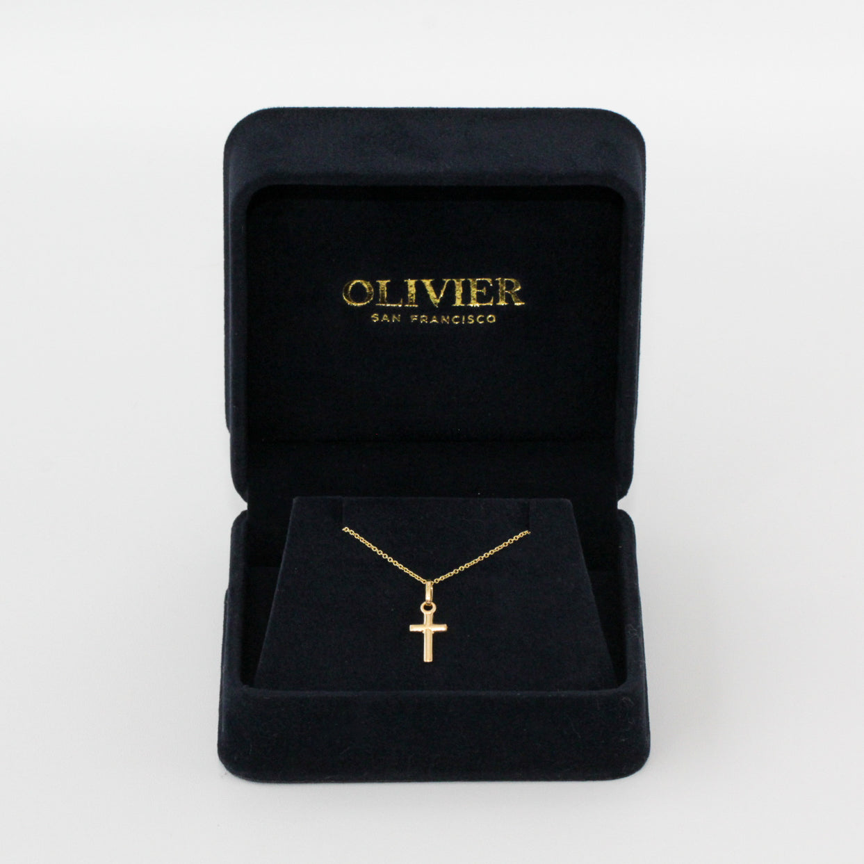 gold cross chain in box