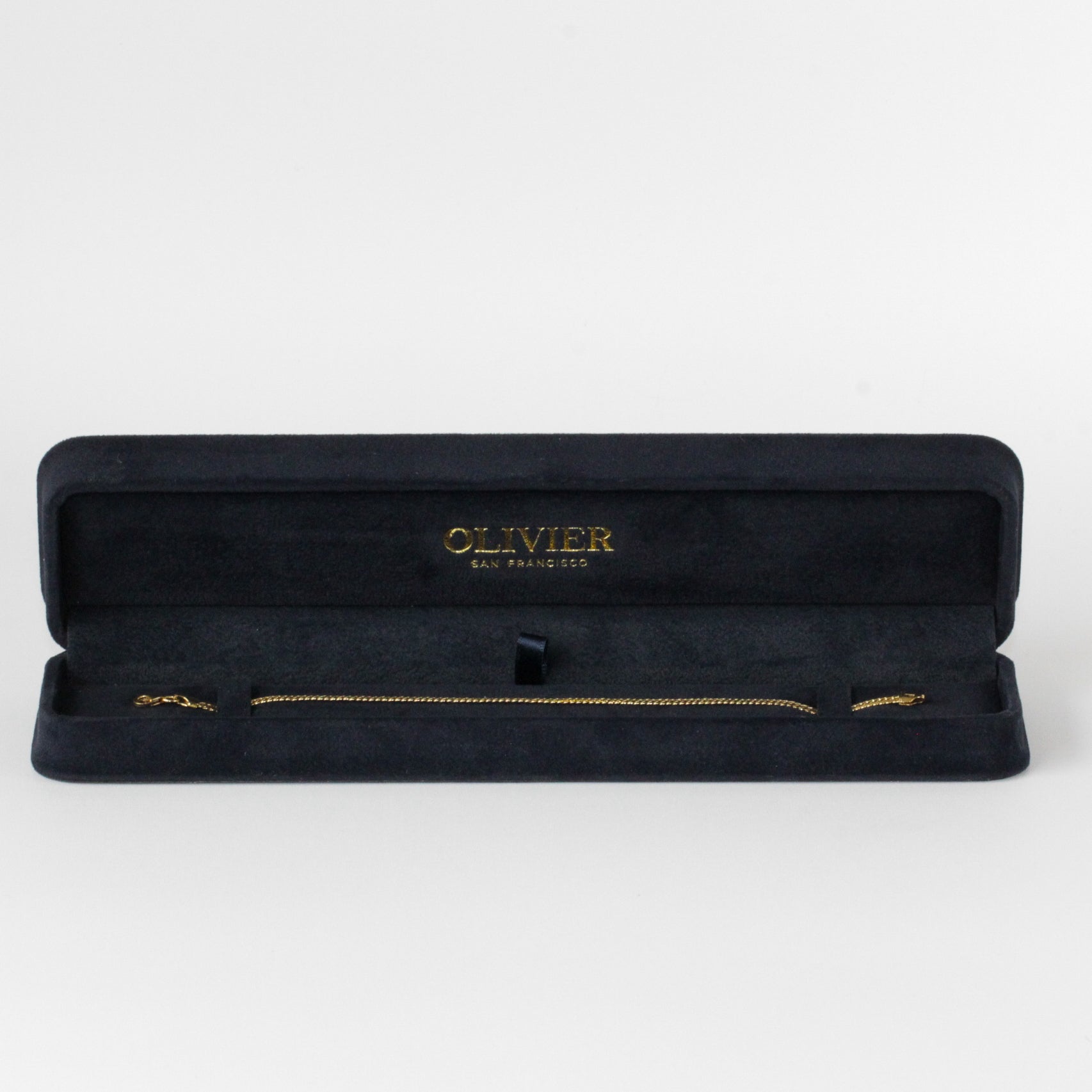 fine gold bracelet in box