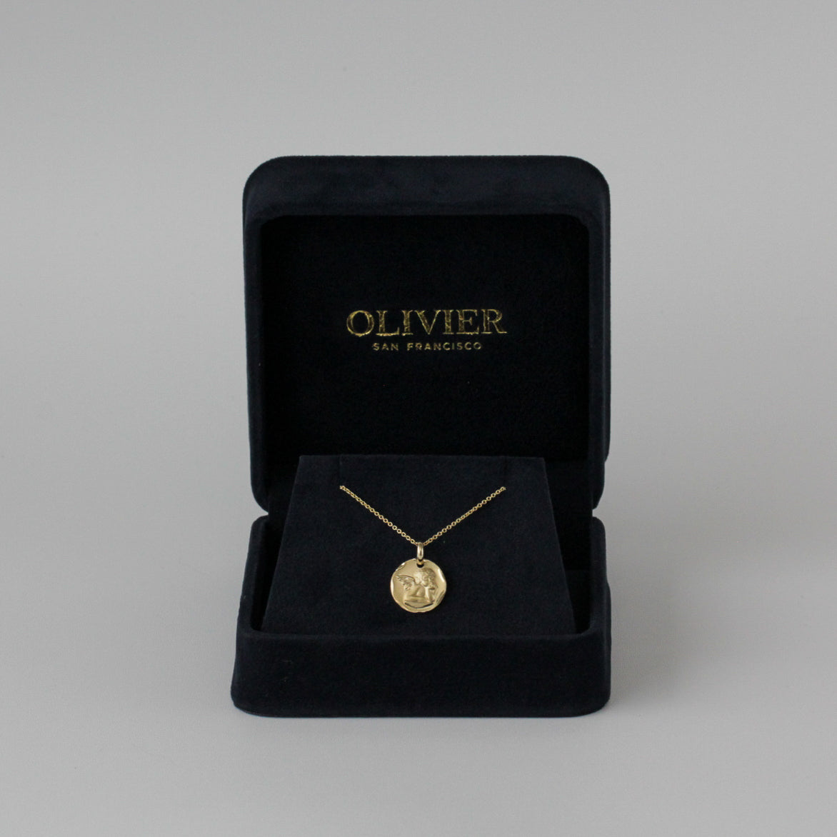 Gold Pendant cherub in box