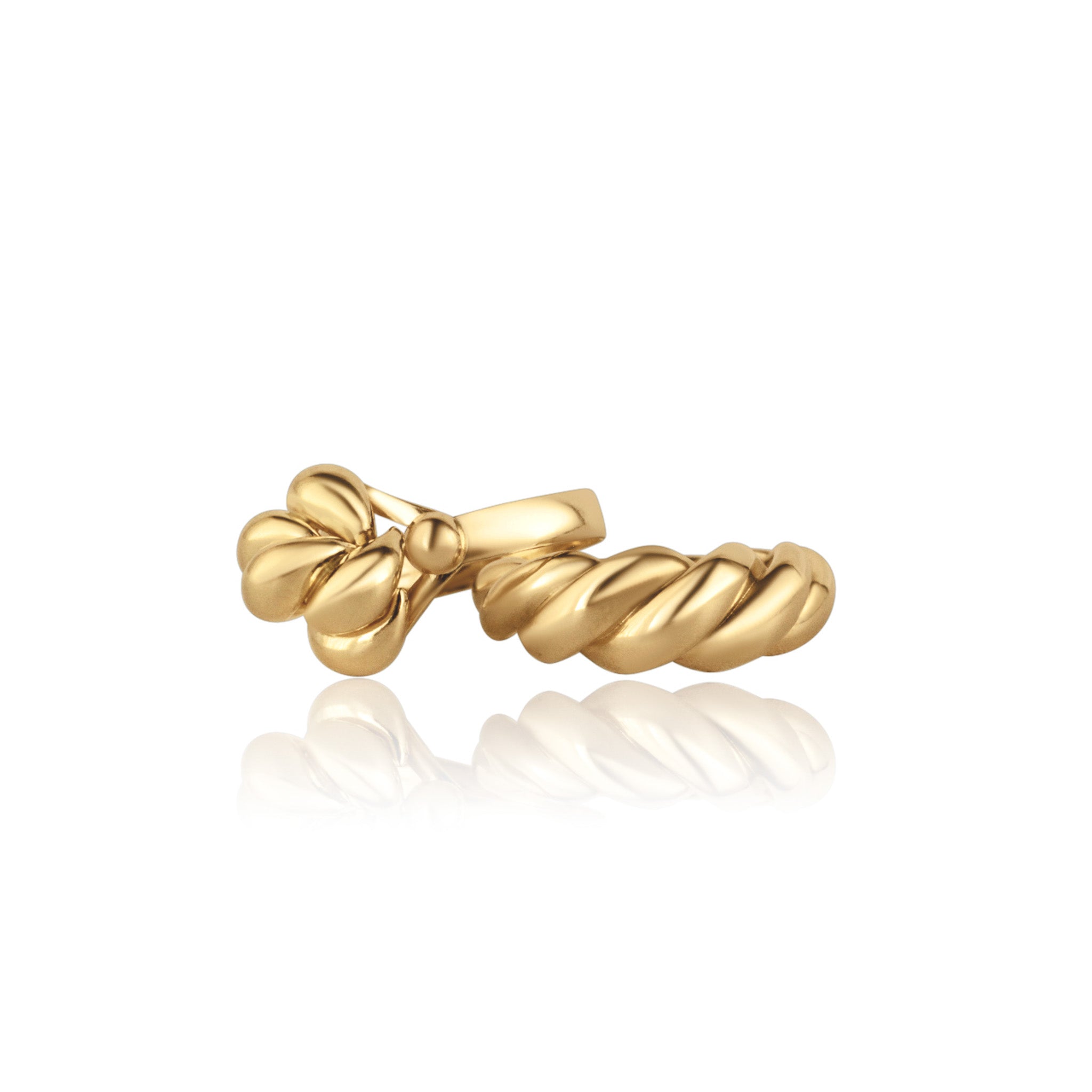 Gold rings on white background