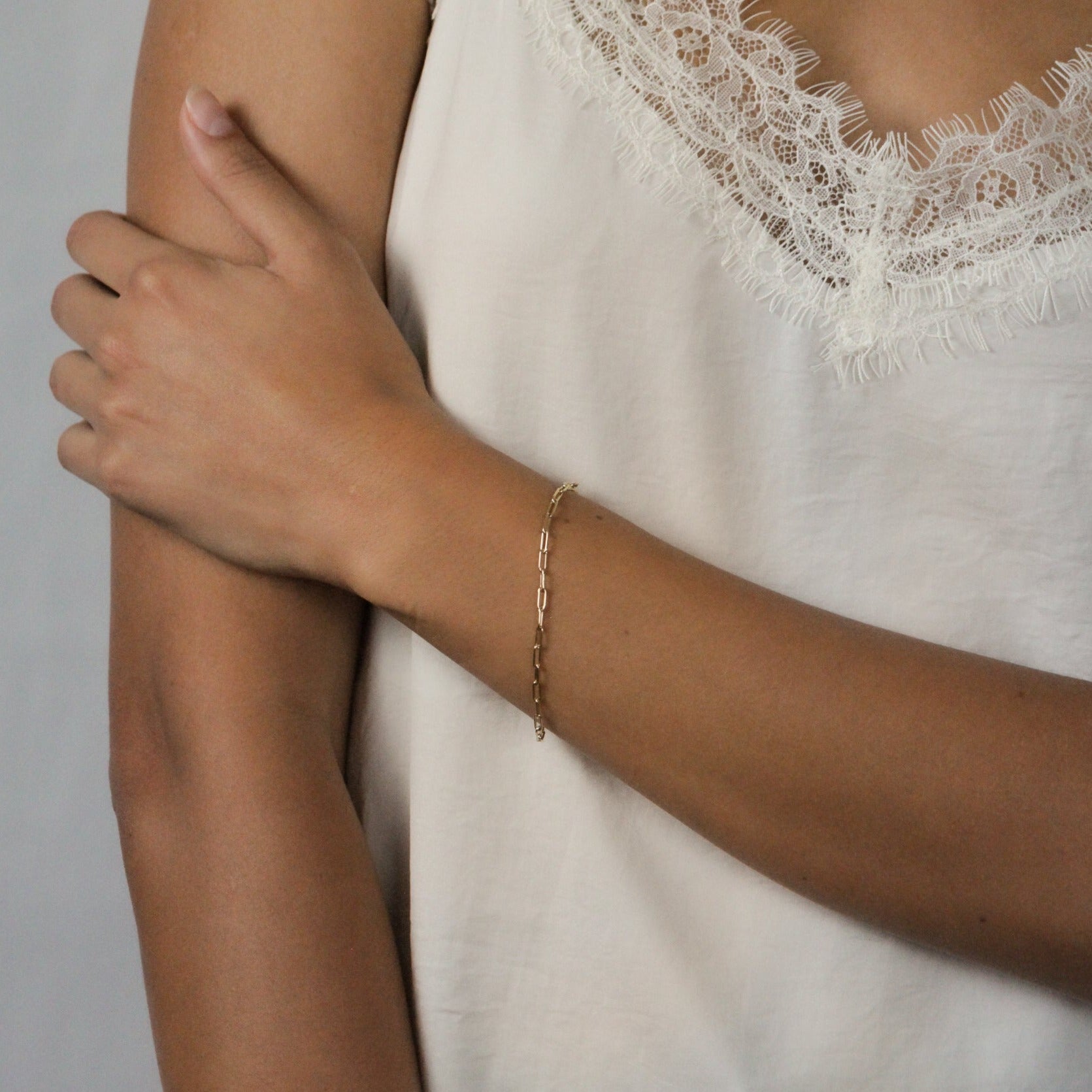 Gold Paper clip bracelet women on hand