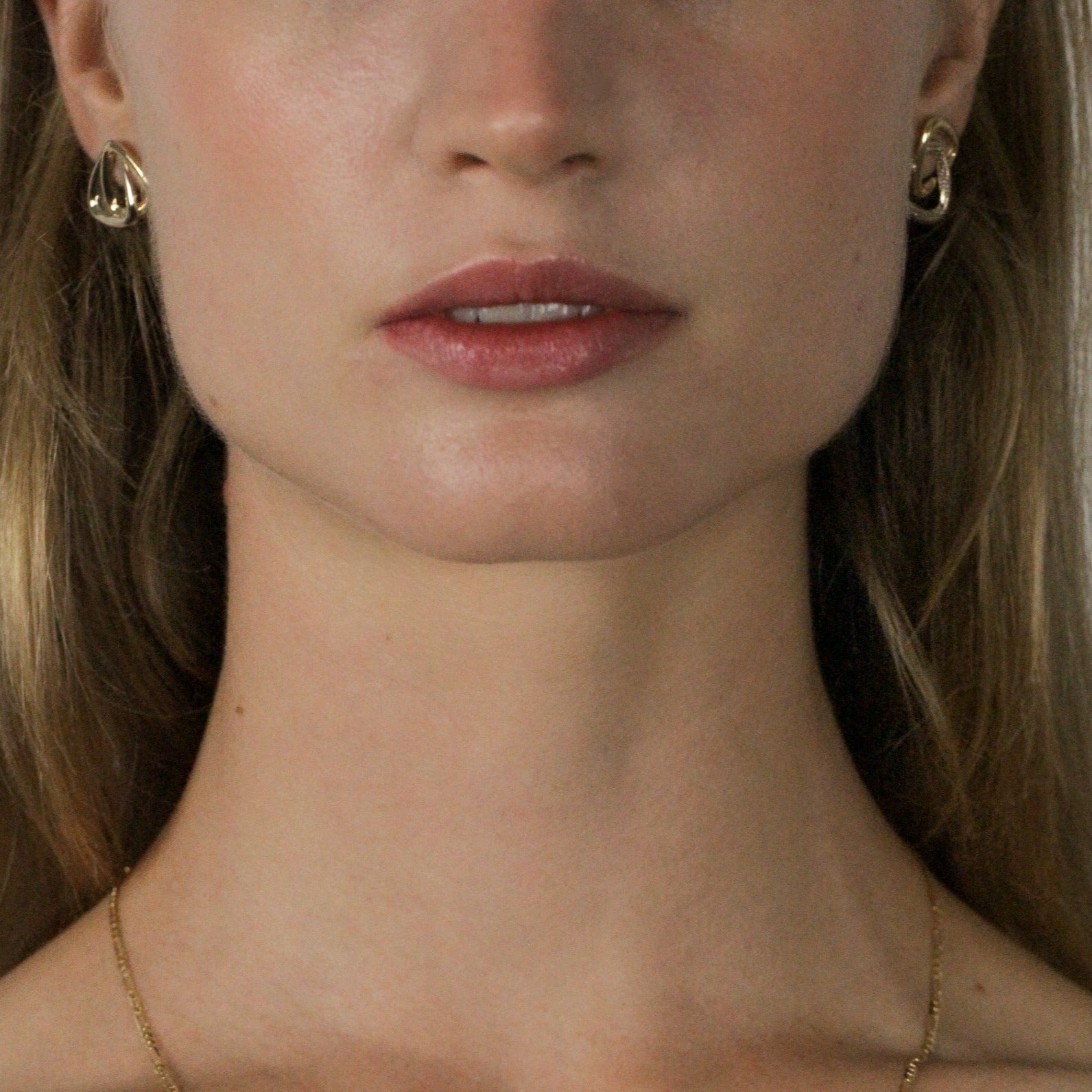gold stud triangle earrings women face