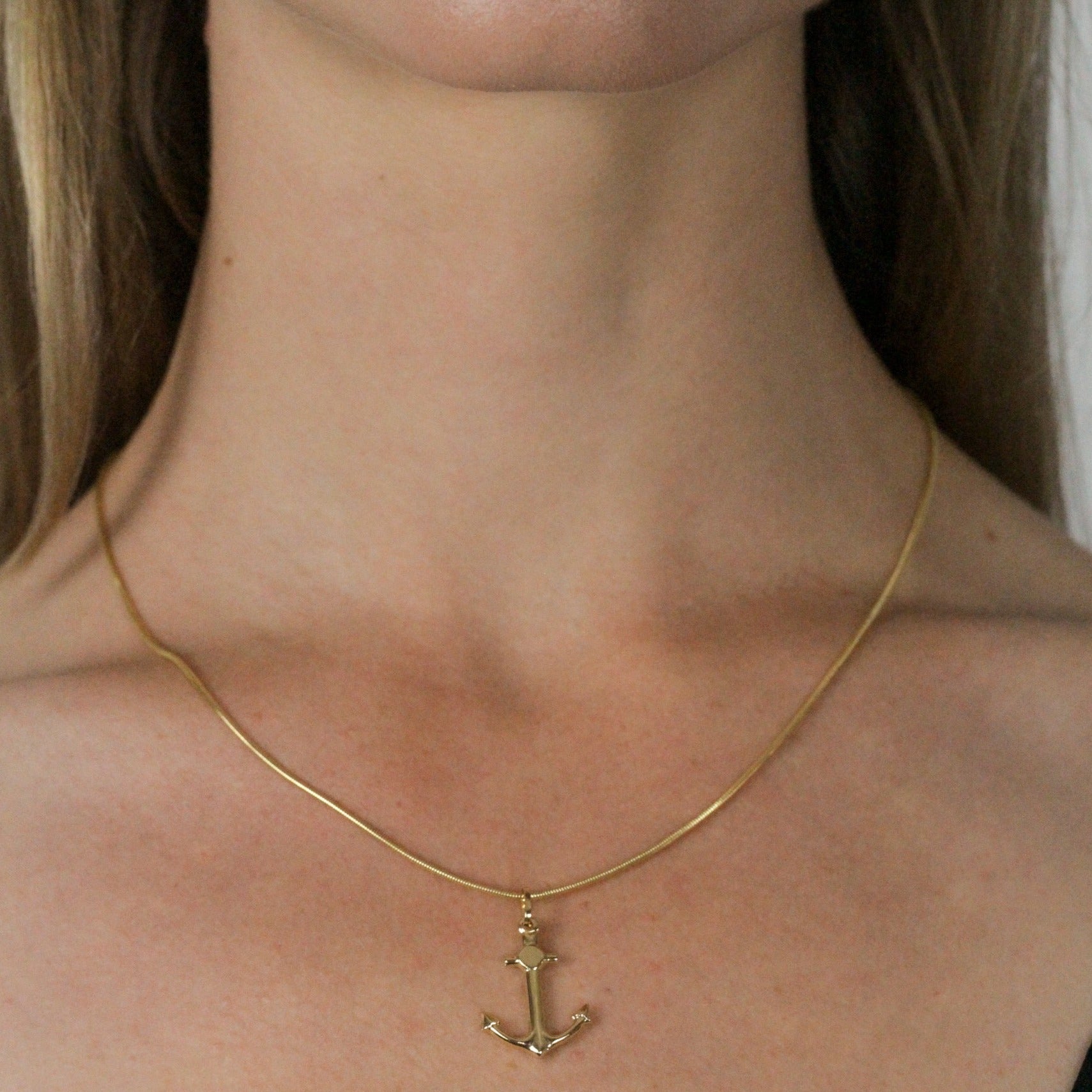 snake gold chain with pendant on model