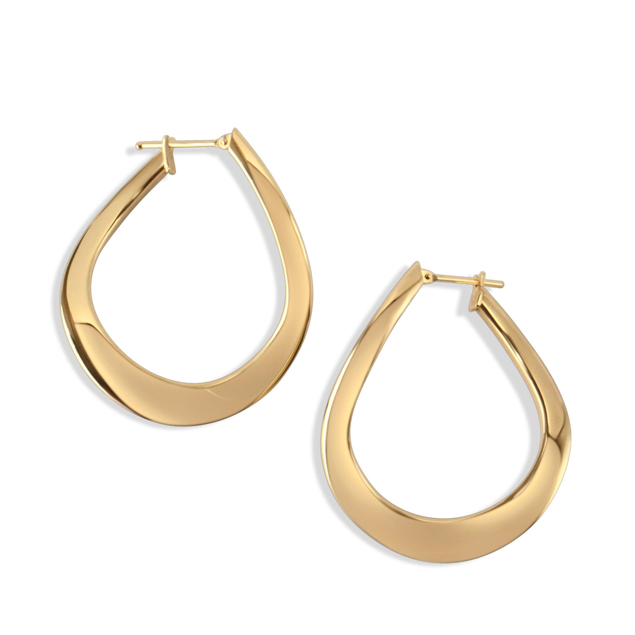 Sculptural gold earrings, statement angle