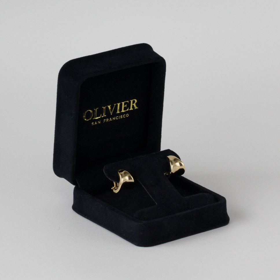 Gold huggies earrings in box