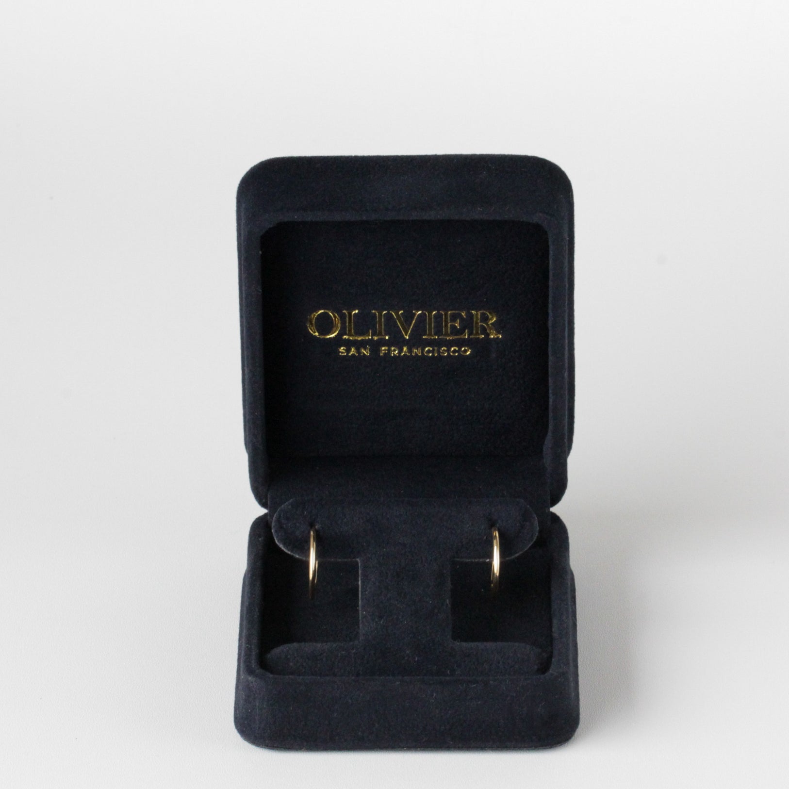 small gold hoops earrings in box