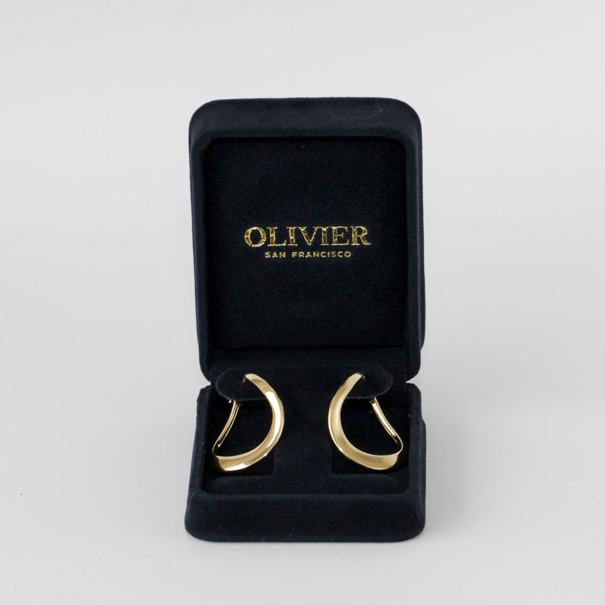 18k sculptural gold earrings in box